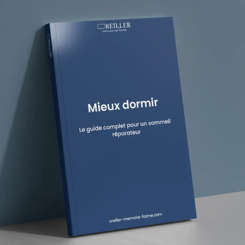 ebook mieux dormir offert pour un oreiller acheté, sur drap satiné gris perle, mur bleu profond