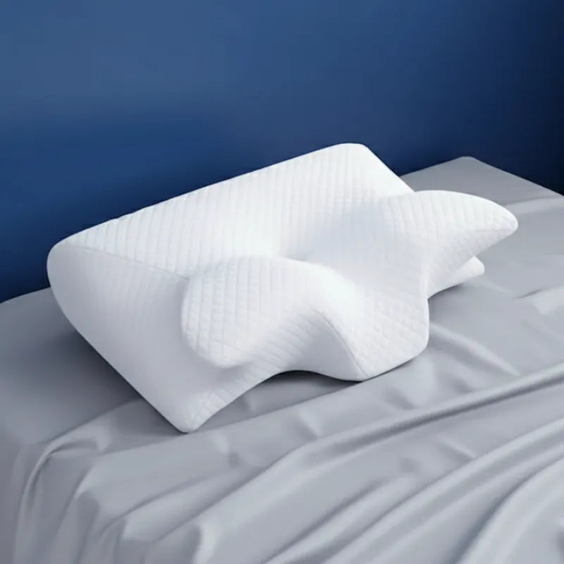 Oreiller a memoire de forme cervical blanc integral 40x60 cm - vue laterale mettant en valeur la forme ergonomique et les zones de soutien.