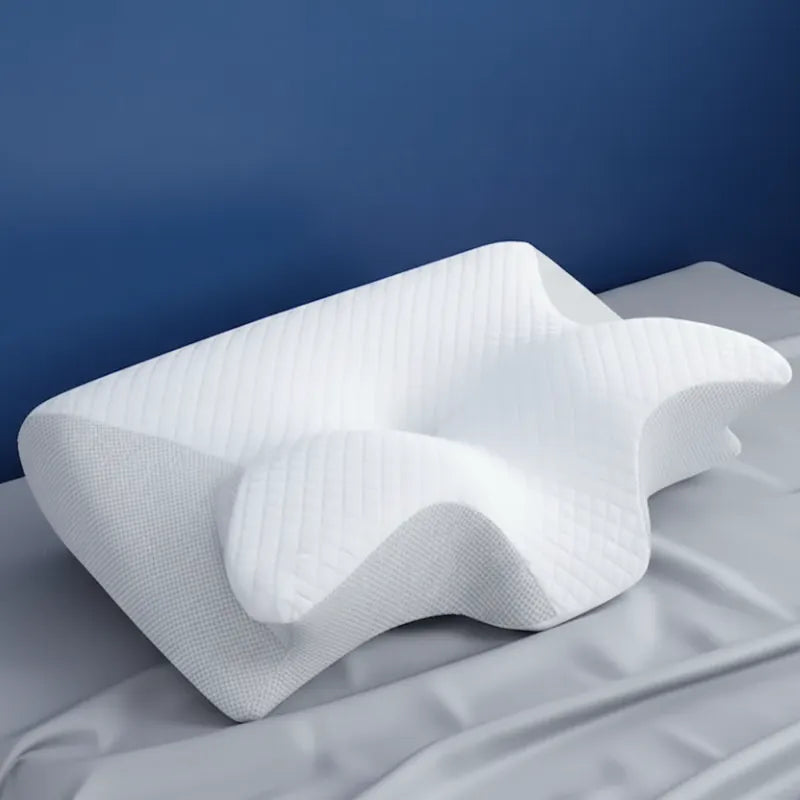 Oreiller a memoire de forme cervical blanc 40x60 cm - vue laterale mettant en valeur la forme ergonomique et les zones de soutien.
