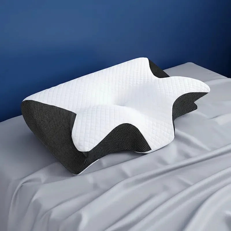 Oreiller a memoire de forme cervical noir 40x60 cm - vue laterale mettant en valeur la forme ergonomique et les zones de soutien.