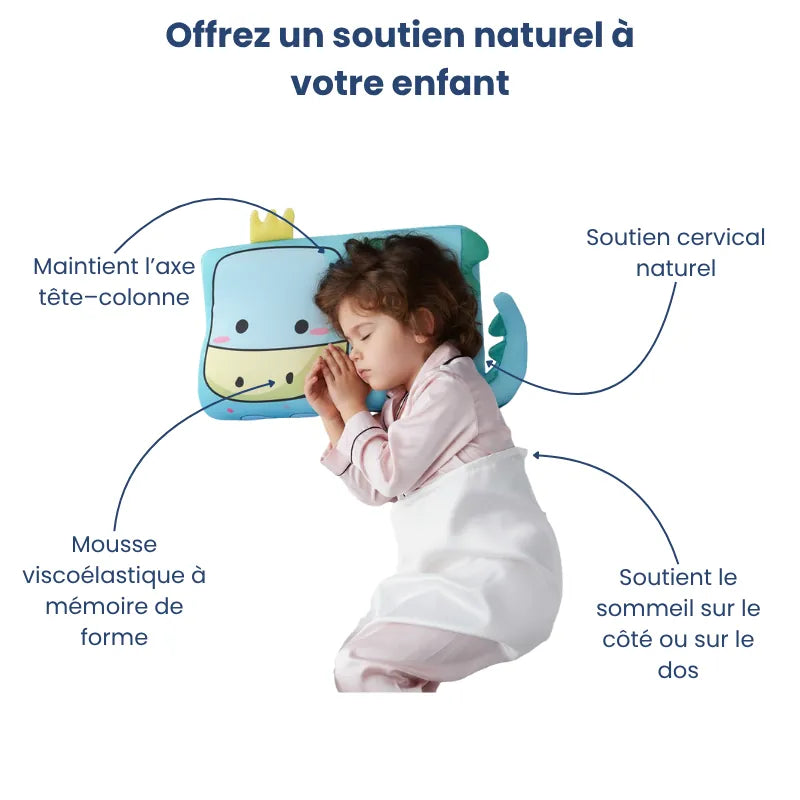 Enfant dormant sur un oreiller mémoire de forme enfant dinosaure montrant les zones de confort et le soutien cervical naturel.